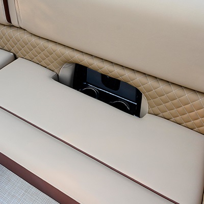 Lounger cup holders with USB port integrated into furniture