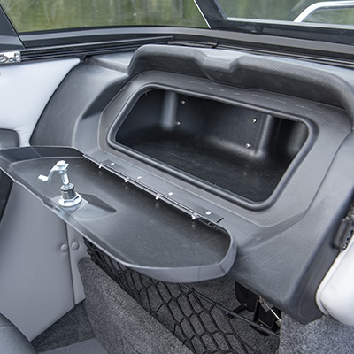 Passenger console with glove box and storage under with extensible cargo net