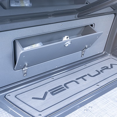 Under helm glove box