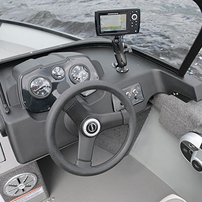 Driver helm shown with Humminbird® Helix 5 on RAM bracket and optional gauges
