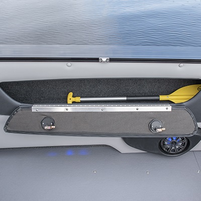 Lockable storage compartment in side panels