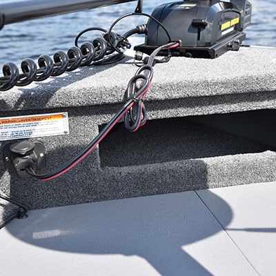 Trolling motor plug and anchor storage