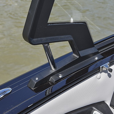 Chrome handle integrated to the windshield