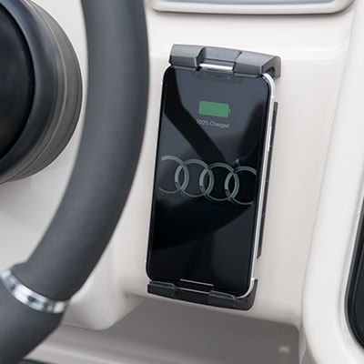 Wireless smart phone charger integrated to the console